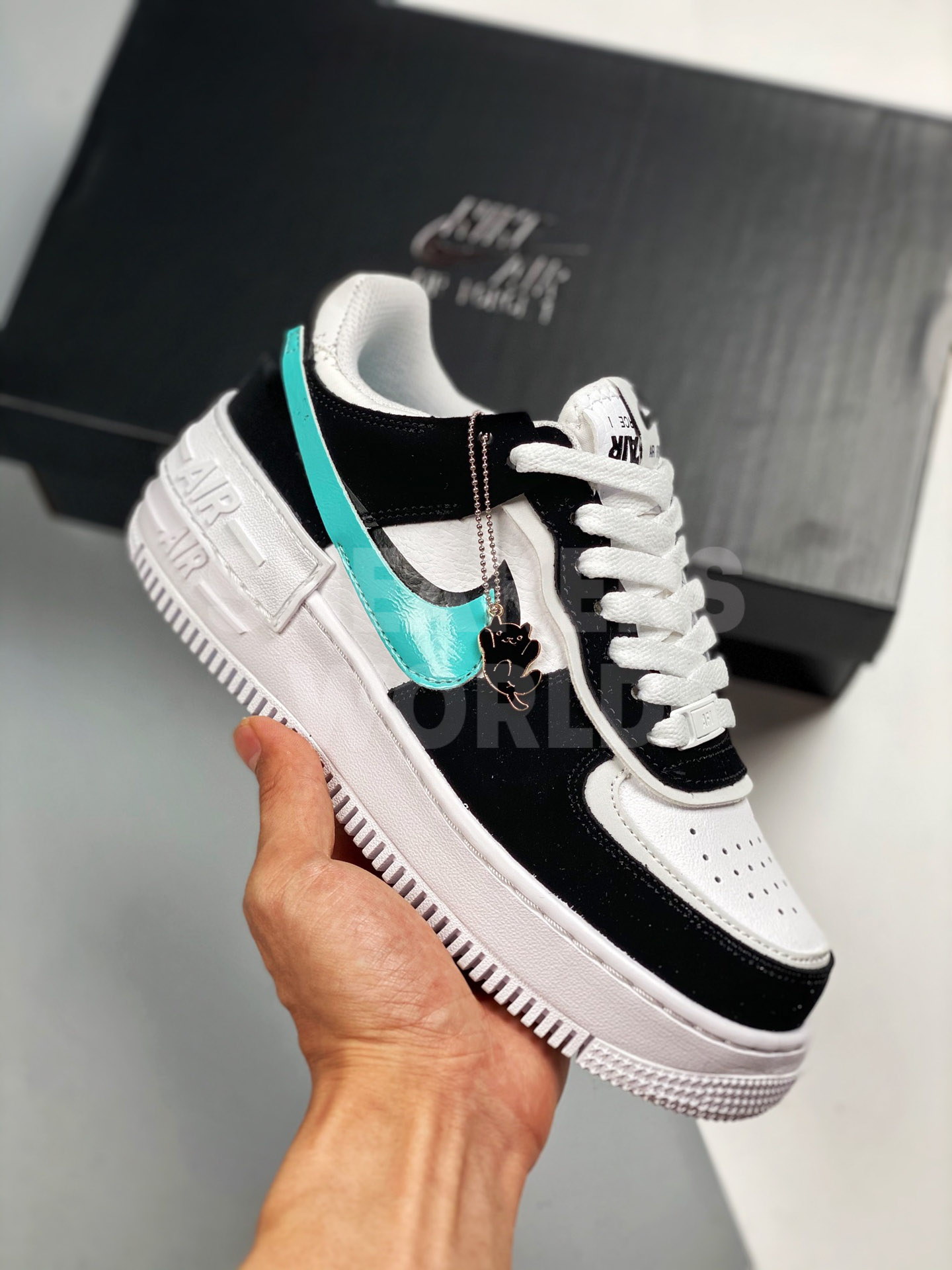 white and black shadow air force 1