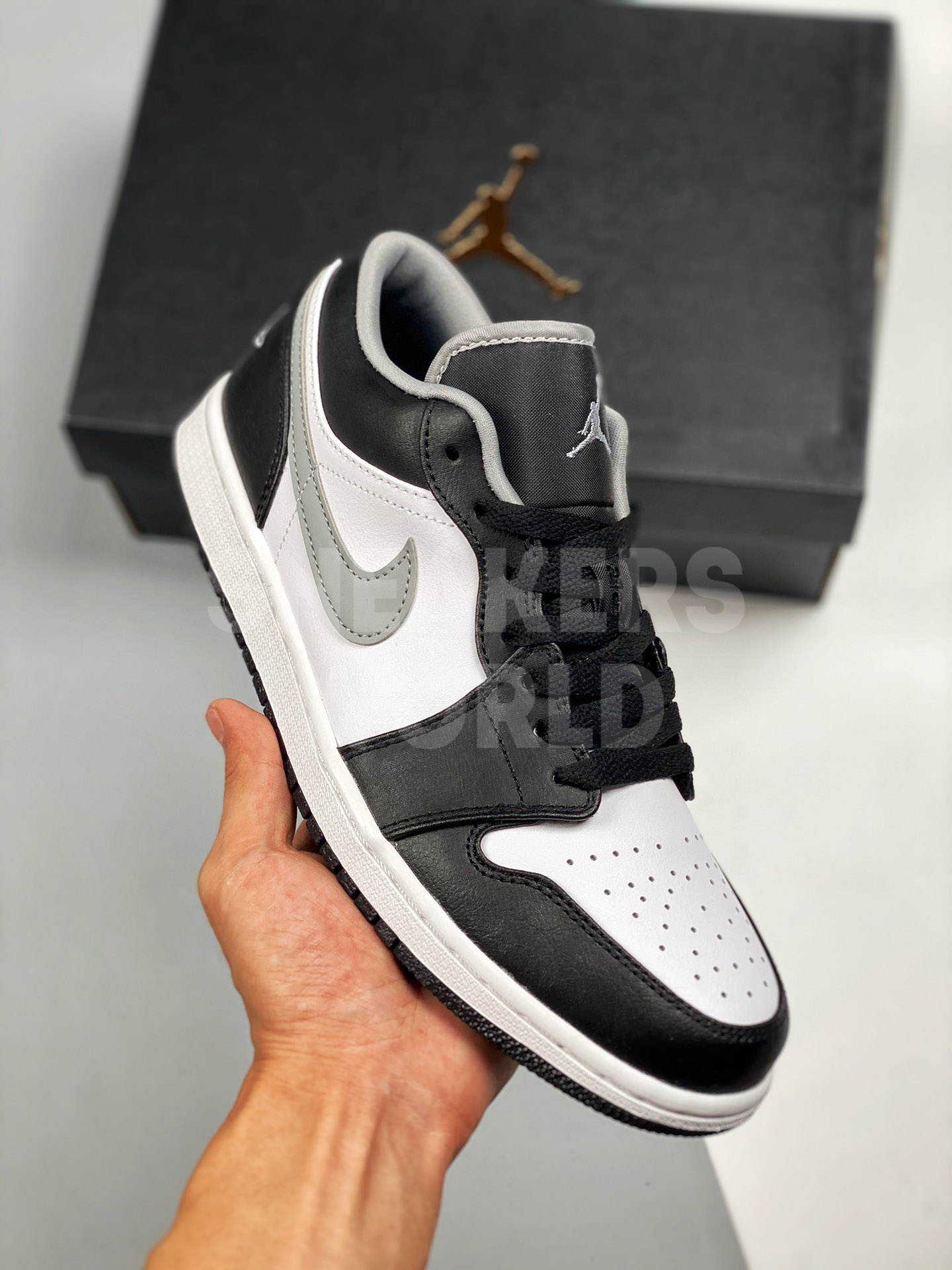 black and grey low jordan 1