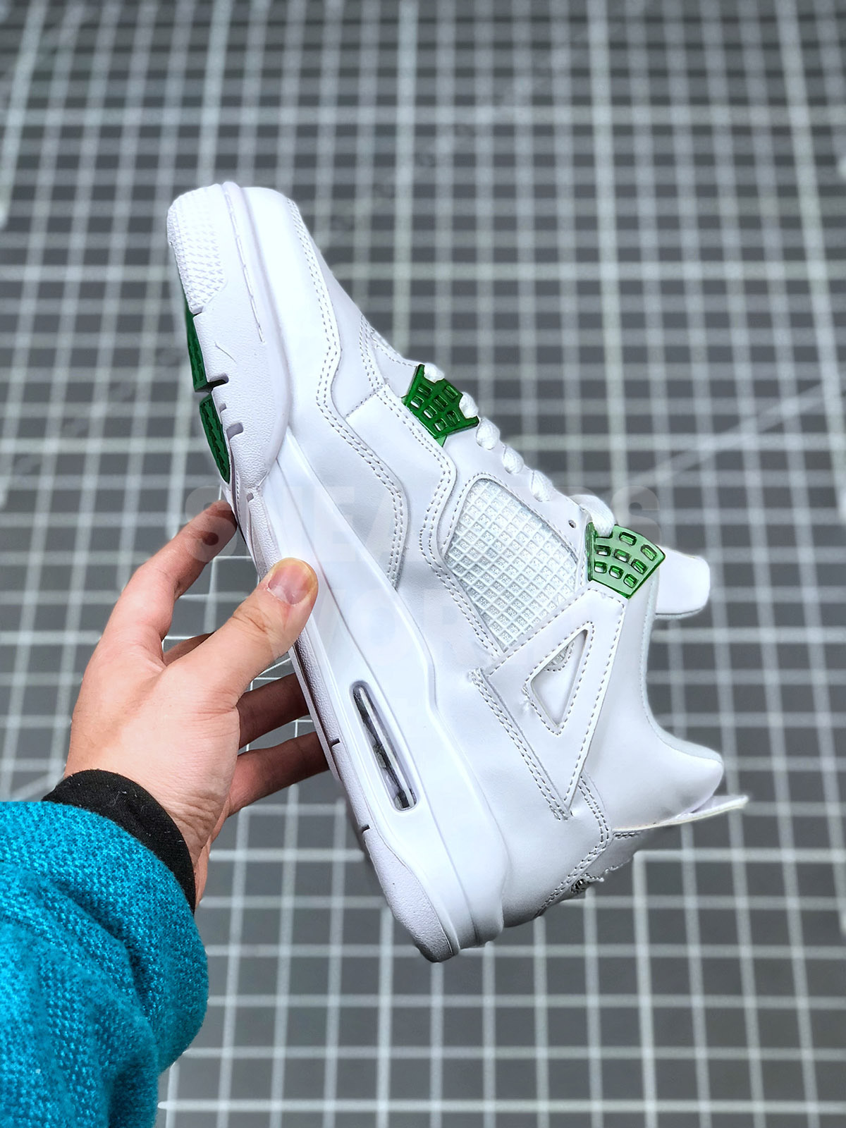 green metallic jordan 4